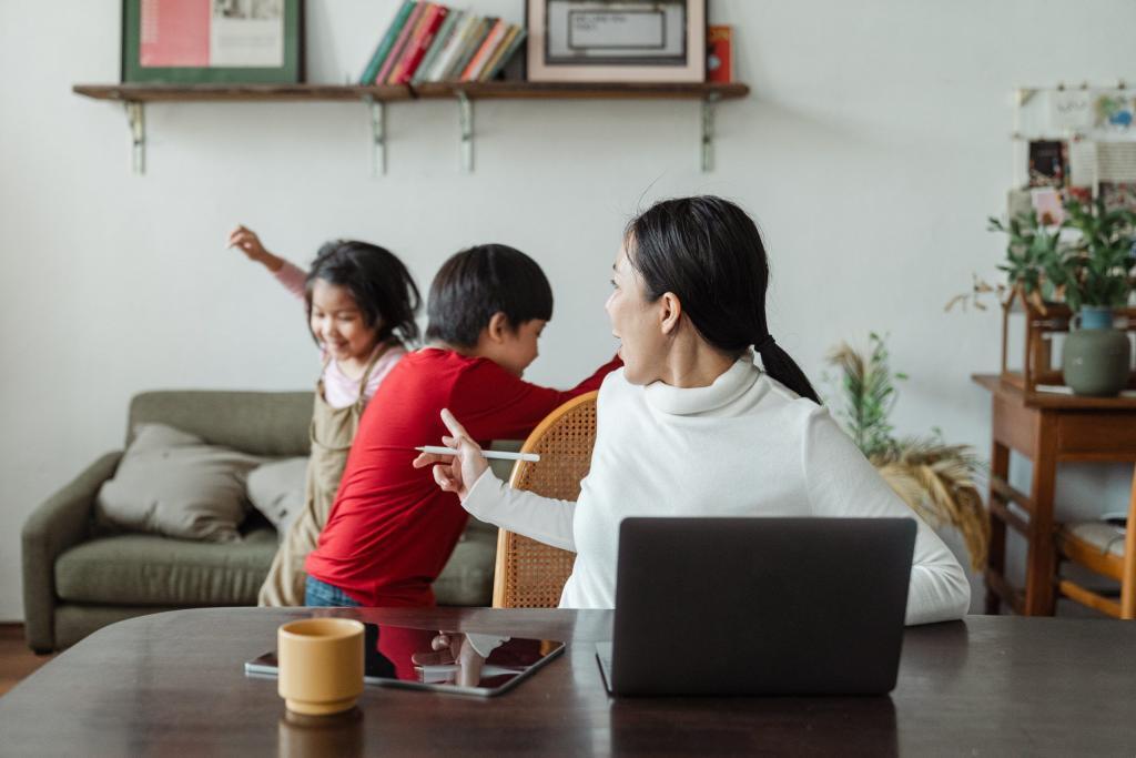 Mother trying to work from home with children playing in background