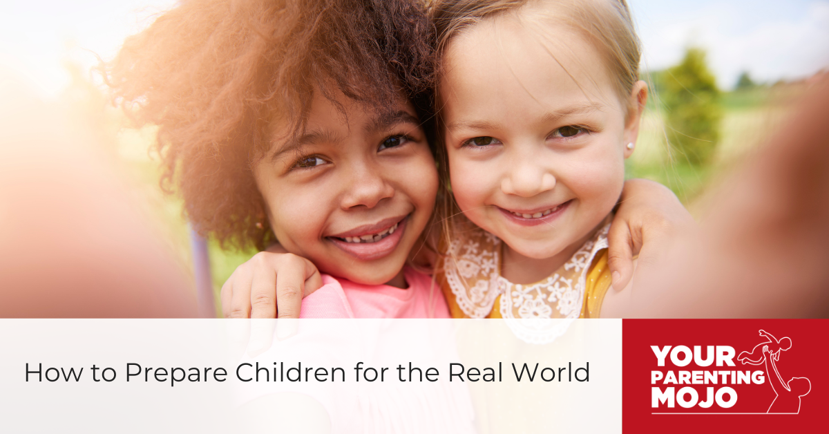 Two smiling young children with their arms around each other taking a selfie outdoors.