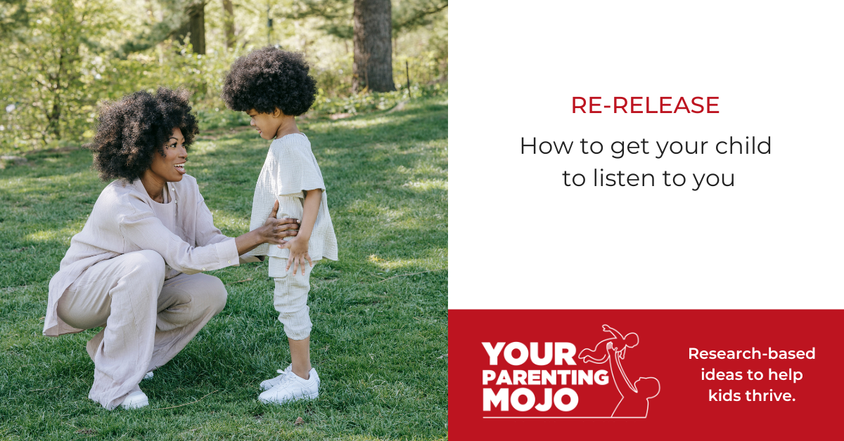 RE-RELEASE: hOW TO GET YOUR CHILD TO LISTEN TO YOU A parent kneels on green grass in a sunlit wooded area, making eye contact and gently holding the arm of a young child with curly hair