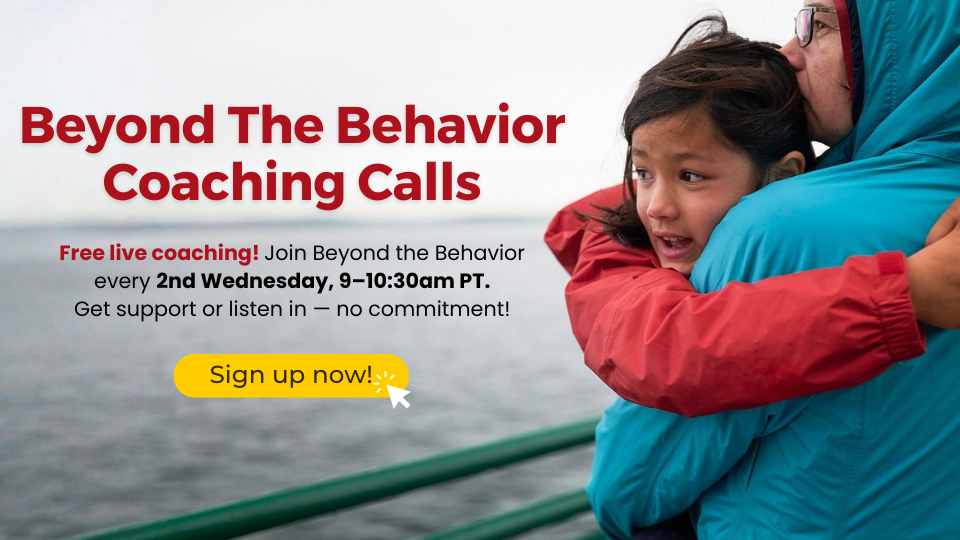 A parent wearing a teal jacket holds a young child in a red sweatshirt close on what appears to be a boat