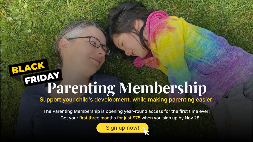 a mother and her daughter lying in a grass