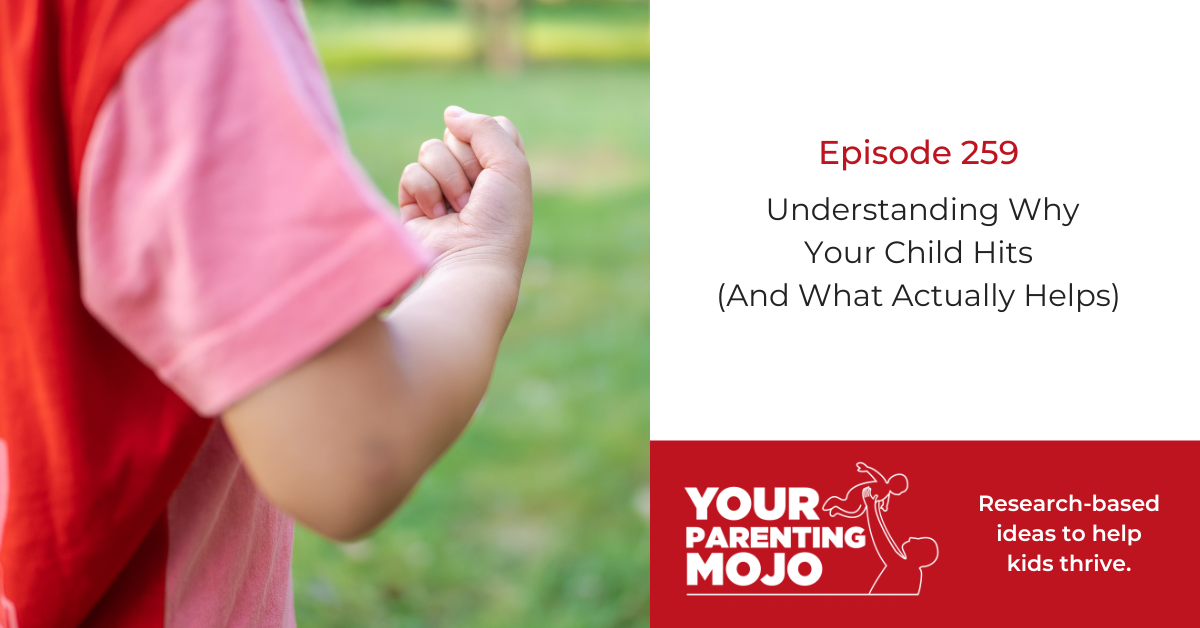 Child's fist shown against blurred green background